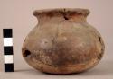 Earthen jar with lip