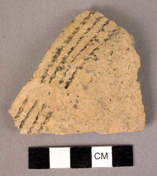 Ceramic rim sherd, orange, cord impressed design