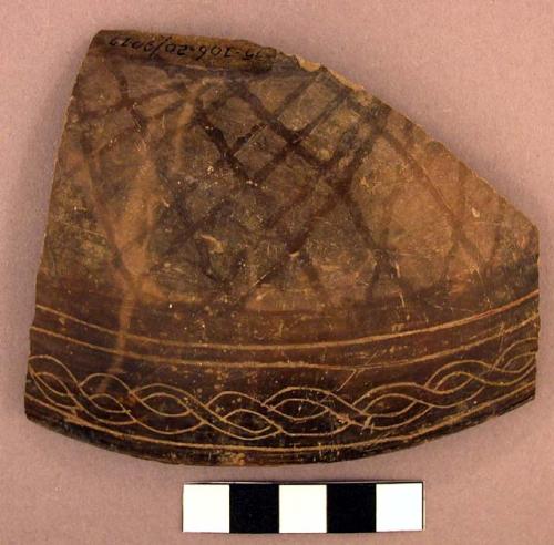 Black incised and stick-polished pottery bowl rimsherd