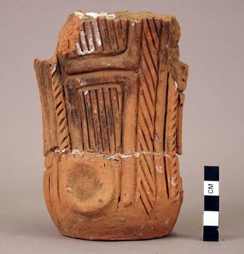 Pottery vase with incised decoration and 1 incised potsherd