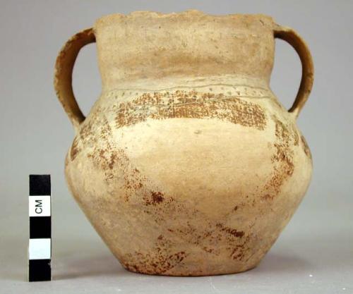 Handled jar, incised decorations