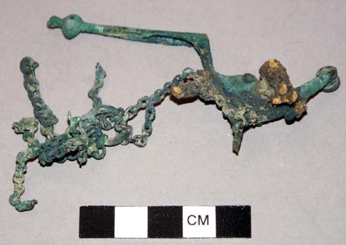 Fibula with chain attached