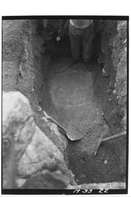 Monjas - Plaque in ball court floor beneath N. temple, after exposing full plaqu