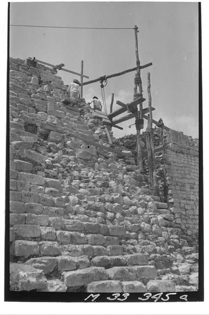 Repairing main stair coping at Monjas, from below