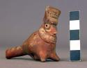 Pottery whistle in form of bird with headdress
