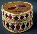 Quilled birch bark basket (A) with lid (B); flower motif