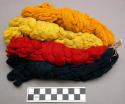 4 hanks of dyed cotton - red, yellow, blue, orange