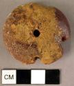 Disk-shaped amber pendant