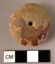 Disk-shaped amber pendant
