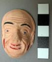 Miniature plaster mask - natural colored human face, long nose