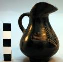 Miniature pottery vessels. incised black glaze.