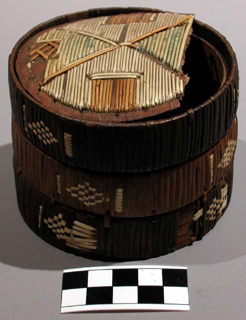 Small circular birch bark box decorated with porcupine quills