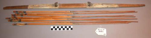 Bow and eight wooden tipped arrows