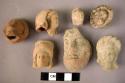 7 pottery human figurine heads