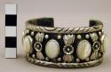 Cuff bracelet, oxidized silver band with floral designs, mother of pearl stones