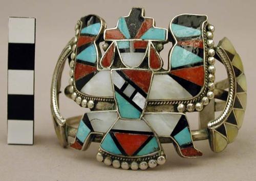 Cuff bracelet, wide silver band with inlaid winged katsina figure