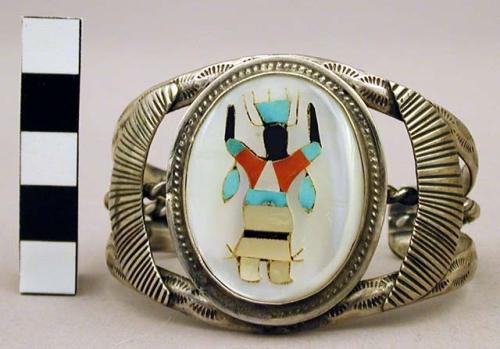 Cuff bracelet, open band, stamped dec., inlaid katsina in mother of pearl oval