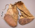 Pair of Omaha child's boots w/ lace up fronts. Rawhide soles. Bison hide uppers