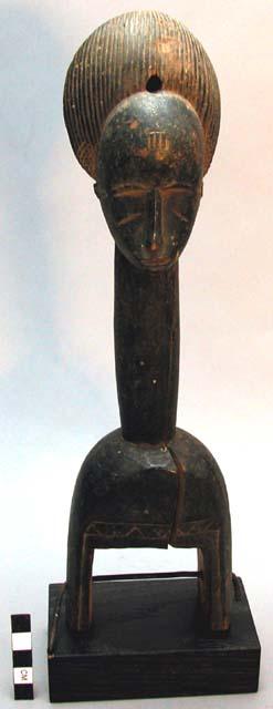 Carved wooden pulley, human head, approx. 13" high x 3.25" long