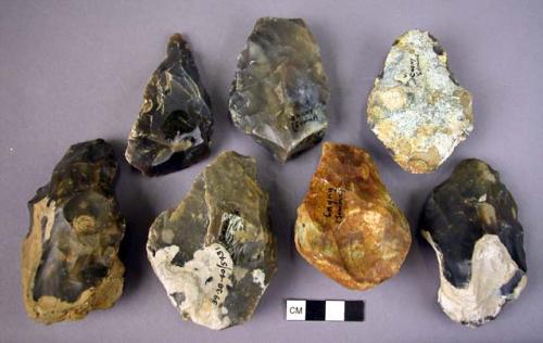 7 small pointed to ovoid flint hand axes