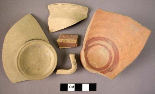 9 Sherds (based rims)