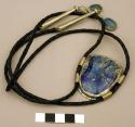 Bolo, large azurite stone in silver setting with thong running through sides