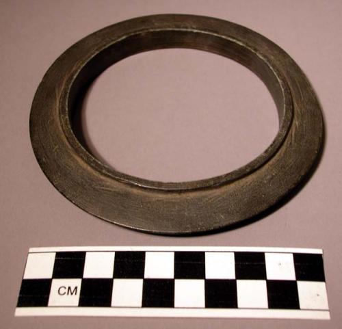 Man's arm bracelet, made of serpentine boiled in fat; usually worn on right arm