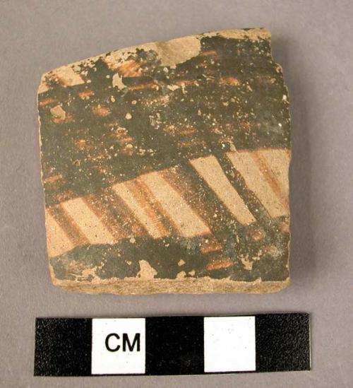 Sherd of painted pottery - goemetric design.