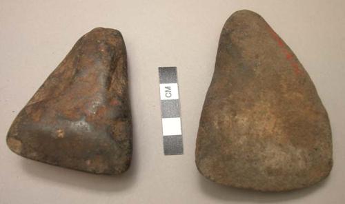 Stones axes and lily leaf for ceremonial bathing