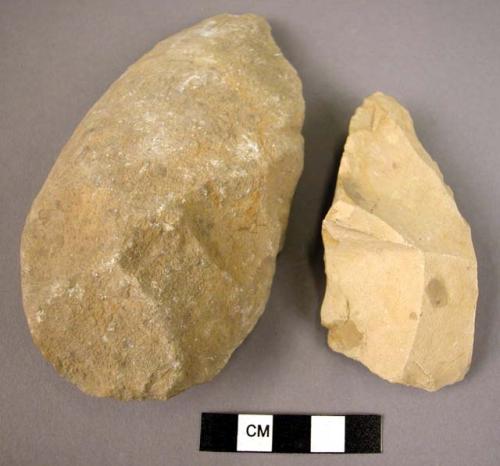 2 large flint flakes, used as side scrapers