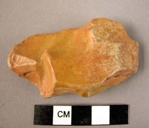 Heavily rolled flint flake implement - probably used as scraper