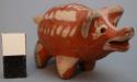 Miniature pottery piggy bank. red ware, white painted decoration. 6 x 3 x 3 cm.