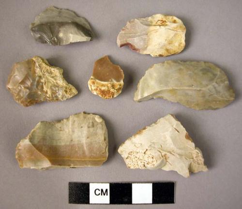 37 flint flakes & fragments with nibbled edge retouch or wear, some notched