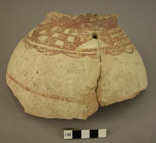 Ceramic jar body sherd, white slipped with painted red geometric design