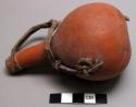 Small gourd bottle with leather strap and top