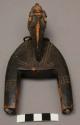 Carved wooden pulley - head, bird? human? (approx. 6"high 3"wide)