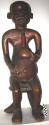 Carved wooden figure with hollow head