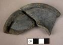 4 potsherds - 1 rimsherd of necked vessel, shiny black ware; 2 rimsherds of prob