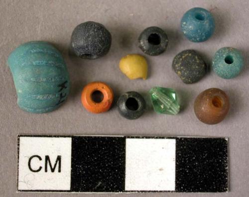 Small pottery and glass beads of various colors