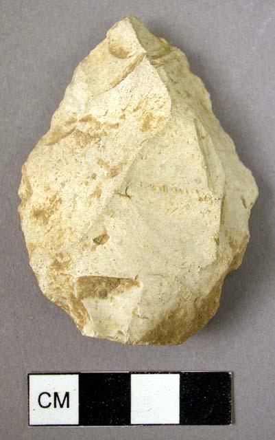 Triangular flint point, worked on both faces, rather thick in section