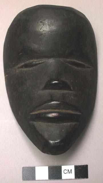 Wooden mask. Probably death mask of Zo's