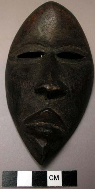 Passport mask (ma. mask) small orange-brown wood mask