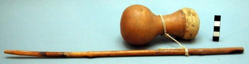 Small dumbbell-shaped gourd container (poporo); used to hold lime when+