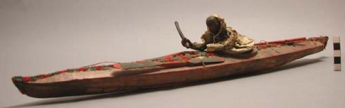 Model of kayak with single figure