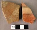 2 potsherds - black and white on red, three color ware - (Wace & Thompson, 1912,