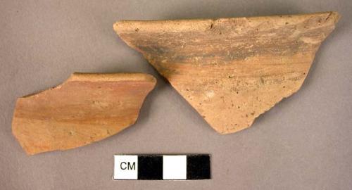 2 rim potsherds; 1 rim and shoulder potsherd with handle