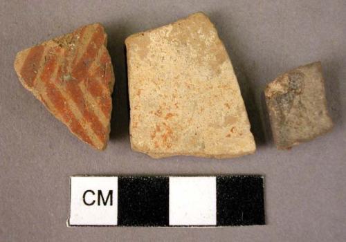 4 potsherds, 1 rim sherd - red on white slip (Wace & Thompson, 1912, Type A3#)