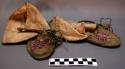 Pair of child's moccasins, possibly Sioux. Hide soles w/ leather uppers