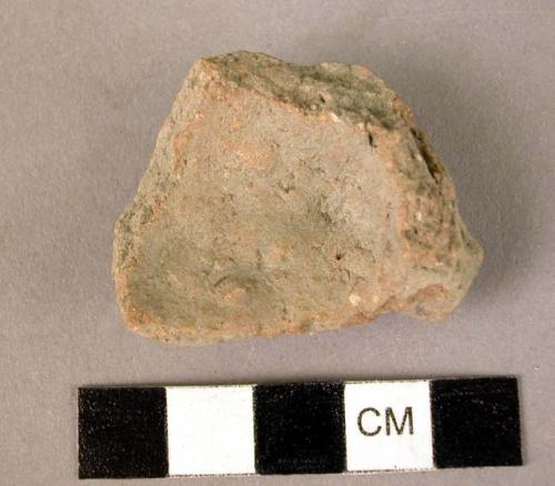 Fragment of ladle of baked clay