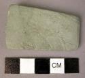 Flat green slate celt